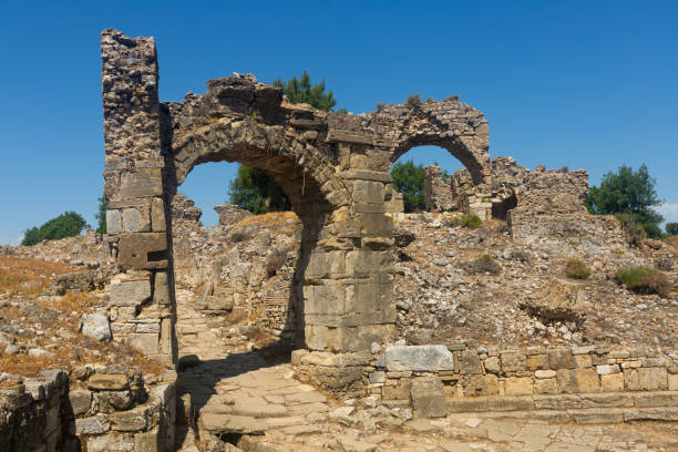 istock Ruins of antique Aspendos eastern gate, Turkey 1408596540