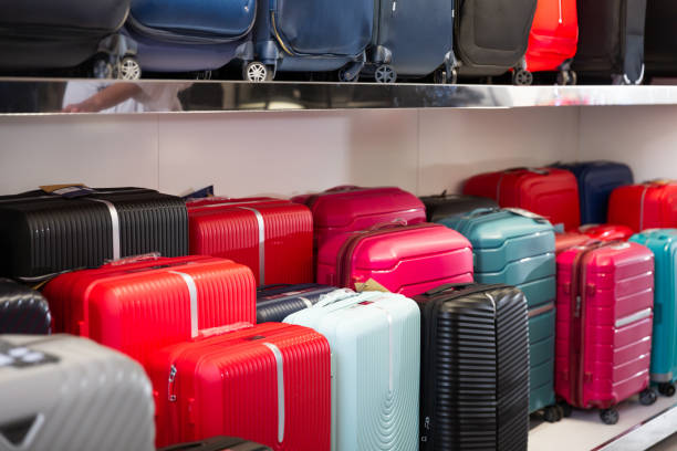 istock Suitcases in dry goods store. Shelving luggage. 1408596578