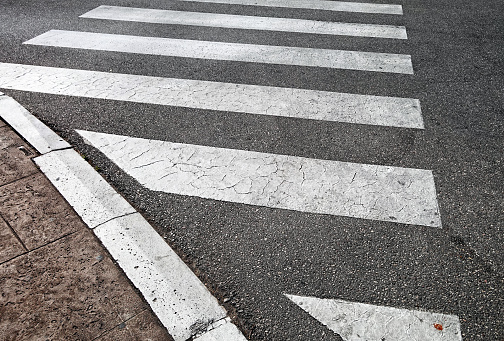 Zebra crosswalk on an asphalt road