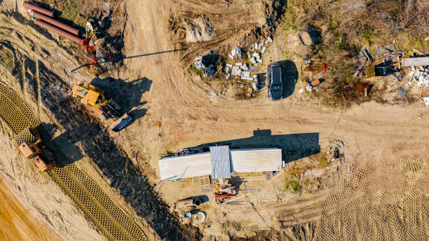 istock Aerial view on road under construction, building the bridge with roundabout 1408599970
