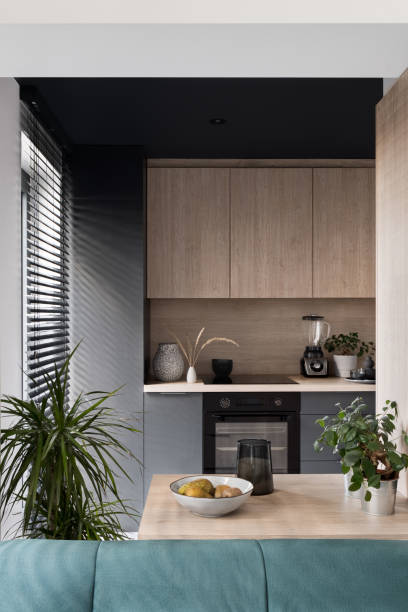 modern kitchen with small island - green studio imagens e fotografias de stock