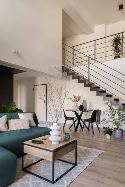 istock Living room with table and stairs 1408602022
