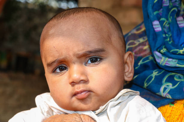 mother holding a cute little baby