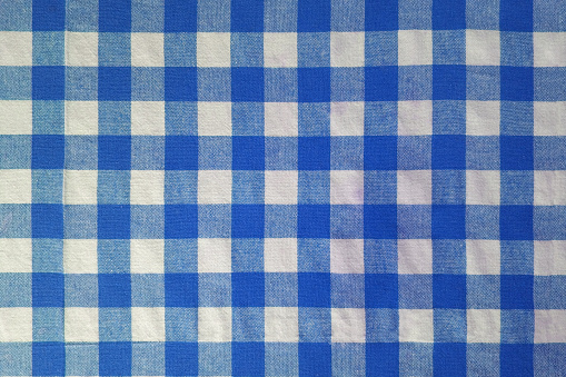 Blue and white classic checkered tablecloth texture