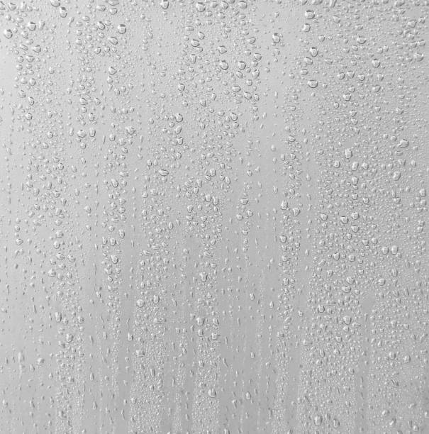 istock The liquid form of the abstract pattern on a silver background. 1408612175