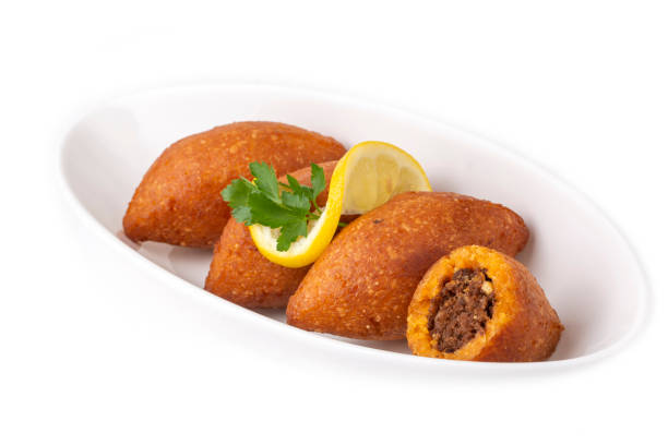 istock Kibbeh is a popular dish in Middle Eastern cuisine (Turkish name; icli kofte) 1408614888