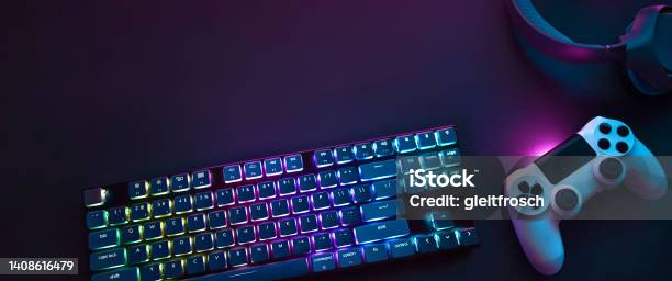 Top Down View Of Colorful Illuminated Gaming Accessories Laying On Table Professional Computer Game Playing Esports Business And Online World Concept Stock Photo - Download Image Now