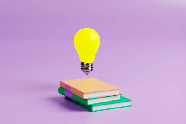istock books and light bulb isolated on pink background. 3d Illustration 1408621726