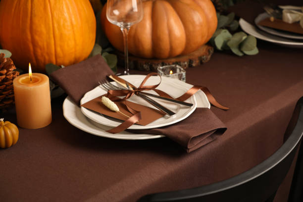 istock Beautiful autumn place setting and decor on table 1408623020