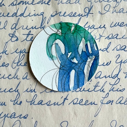 Paper circle on old love letter