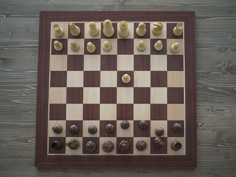 Wooden chess board with Stauton Nº5 wooden pieces. Concept improvements of the intellect in school education