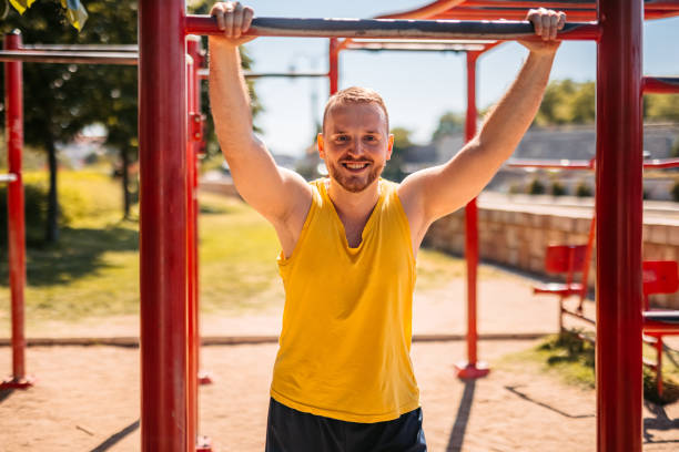 istock Young Man Stretching Before A Workout Outdoors 1408626736