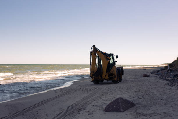 istock Excavator on Beach, Cliff, Baltic Sea, Fale, Forest 1408629563