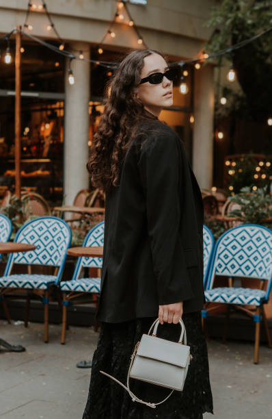istock Beautiful elegant girl on a walk after hard work day 1408632207
