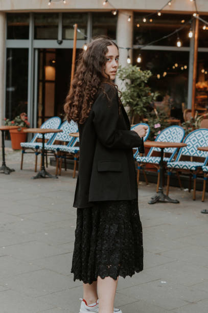 istock Beautiful elegant girl on a walk after hard work day 1408632242
