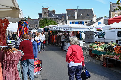 Pléneuf-Val-André, Brittany, France, June 28, 2022 - People on the weekly summer market of local producers and craftsmen in Pléneuf-Val-André, Brittany