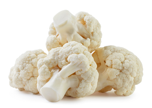 Heap of cauliflower close-up on a white background. Isolated