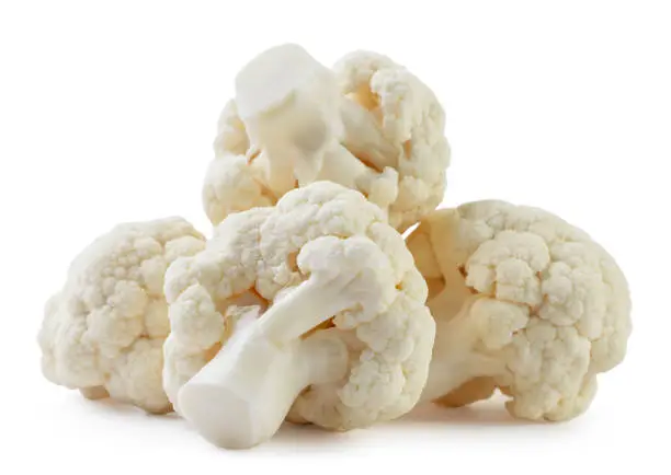 Photo of Heap of cauliflower on a white background. Isolated