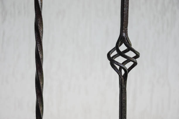 istock wrought iron stair railings.black metal on a white background. 1408637035