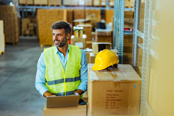 istock Male warehouse worker checking an order in the warehouse 1408641201