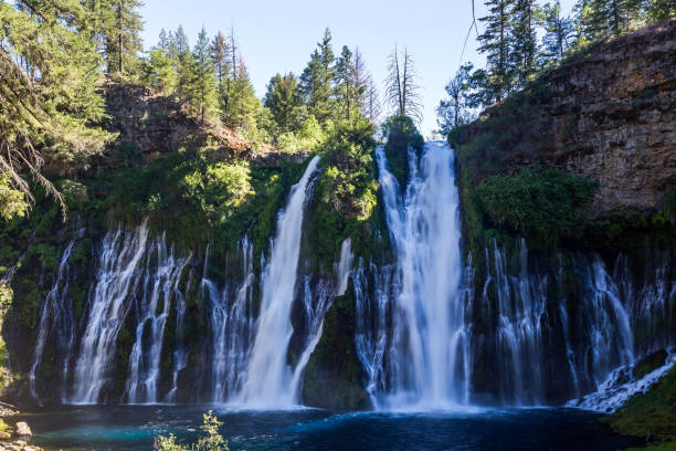 McArthur-Burney Waterfalls in California Spectacular view of the McArthur-Burney Falls in California burney falls stock pictures, royalty-free photos & images