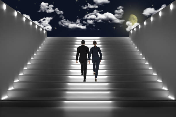 Architecture. Couple man woman staircase at night illuminated - 3D Illustration 3d illustration. Architecture. Couple man woman staircase at night illuminated rising towards the background of the illuminated city. life stile stock pictures, royalty-free photos & images