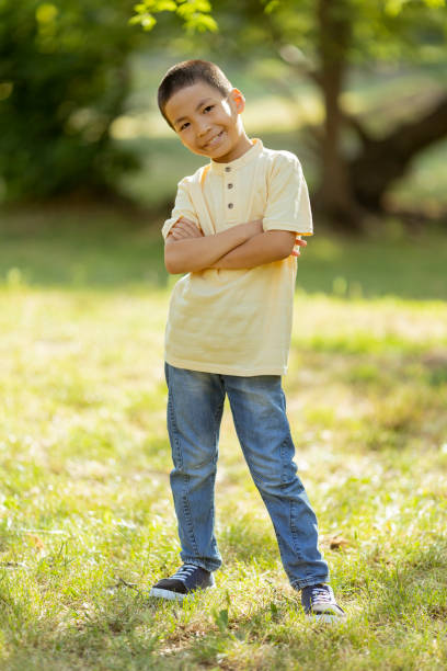 istock Little Korean boy standing in the park 1408646493