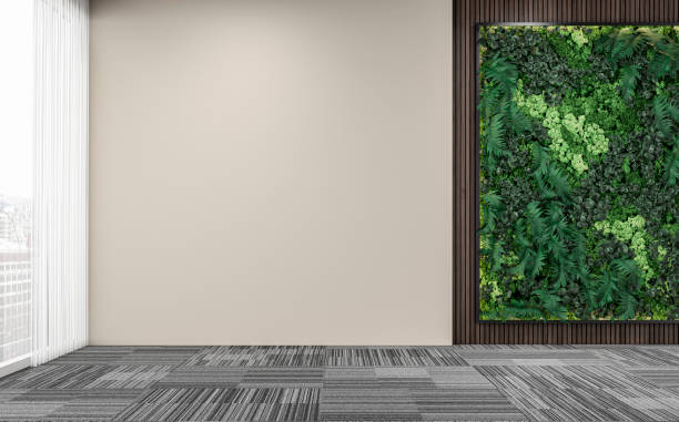 istock Empty unfurnished office interior with a vertical garden, partly hardwood background, partly beige plaster wall, and large windows 1408647526