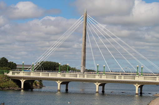 The beautiful lake and bridges at Southport, this has been taken on a summer day. The calm and tranquil water can be seen in this image.