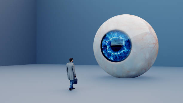 istock Man stands in front of giant eye in surreal image 1408655013