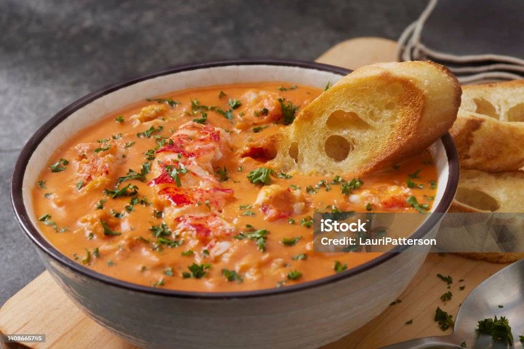 Lobster Bisque Lobster Bisque with Toasted Baguette Slices Lobster - Animal Stock Photo