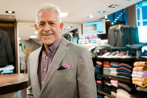 istock Confident senior male men's store owner 1408667676