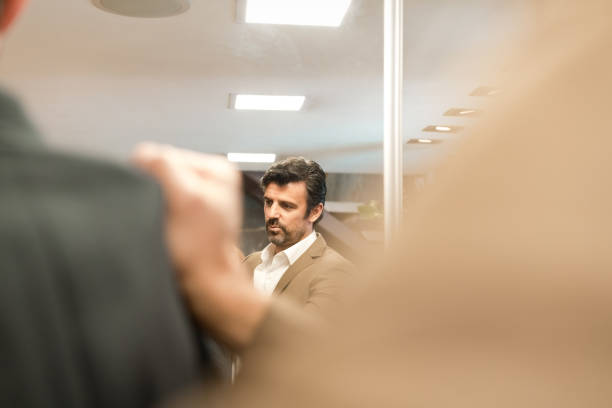 istock Male customer at clothing store 1408668993
