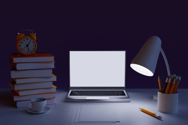 istock School desk with school accessories and laptop under lamp light. Study at night. 3d render 1408669964