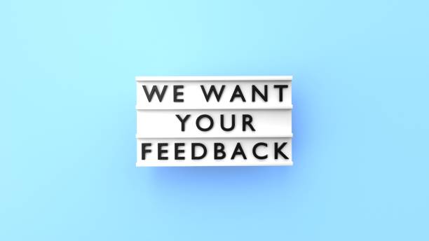 We Want Your Feedback Text is Displaying on a Lightbox on Blue Background We Want Your Feedback text is displaying on a vintage letter board lightbox against blue background. Easy to crop for all your social media and print sizes. desire stock pictures, royalty-free photos & images