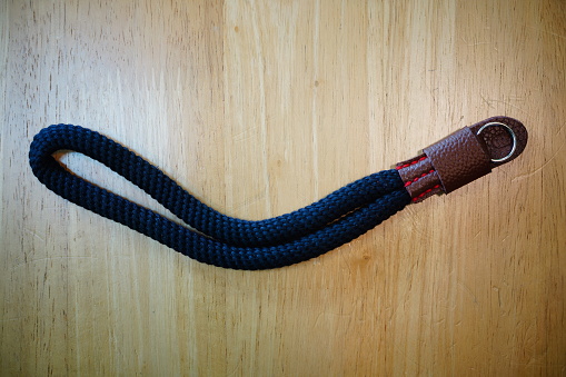 Black wrist strap for mobile or camera