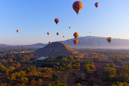Sunrise on hot air balloon over the Teotihuacan pyramids