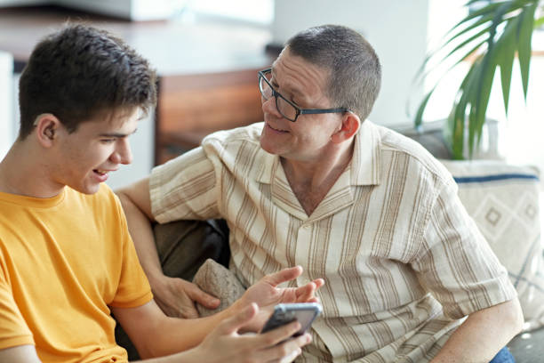 istock Deaf teenager and father spending time together 1408686778