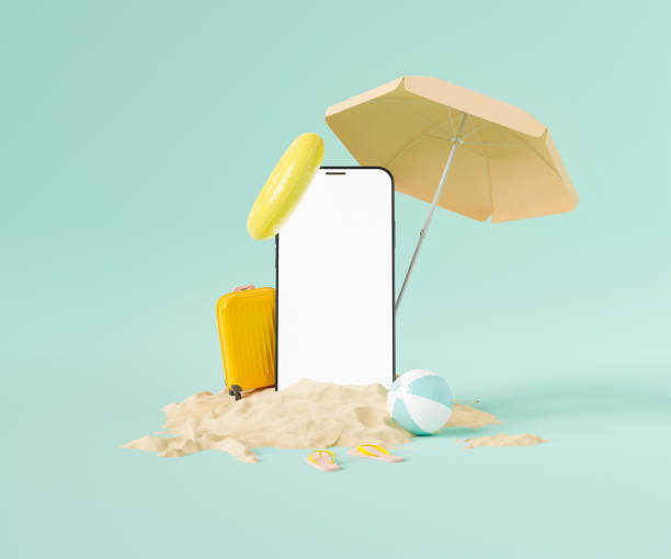 istock Smartphone and beach supplies in sand 1408687974