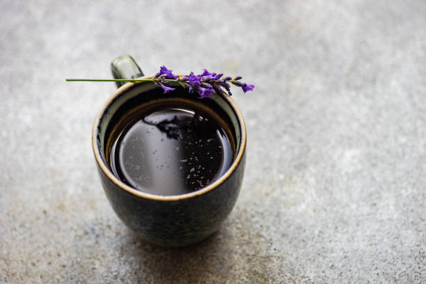 istock Ceramic cup of coffee with lavender 1408690193