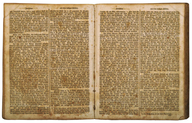 istock Open old book used paper pages isolated white background 1408696232