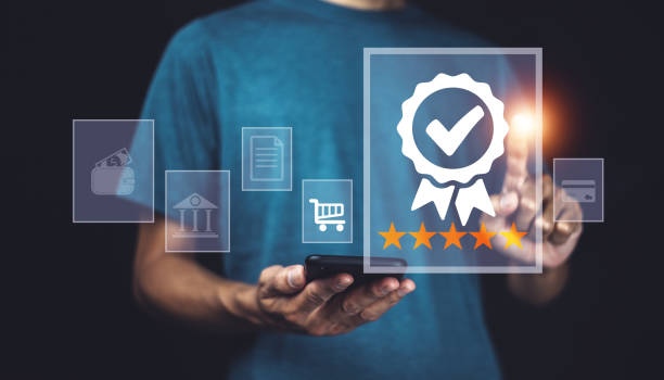 istock Businessman using smartphone give five star satisfaction customer review best quality excellent 1408697297
