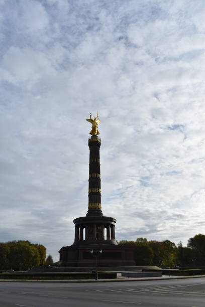 istock Victory Column tower and golden statue stock photo 1408701791