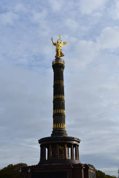 istock Victory Column tower and golden statue stock photo 1408701801
