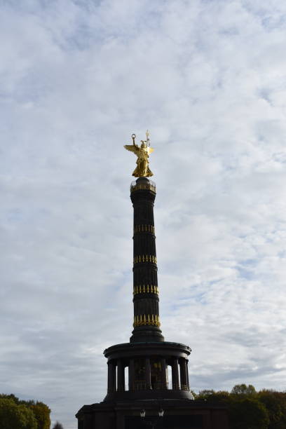 istock Victory Column tower and golden statue stock photo 1408701846