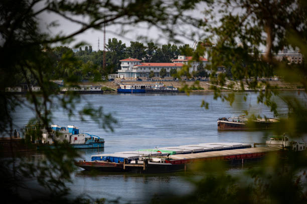 istock Barges and ships crossing Danube river between Romania and Bulgaria 1408708678