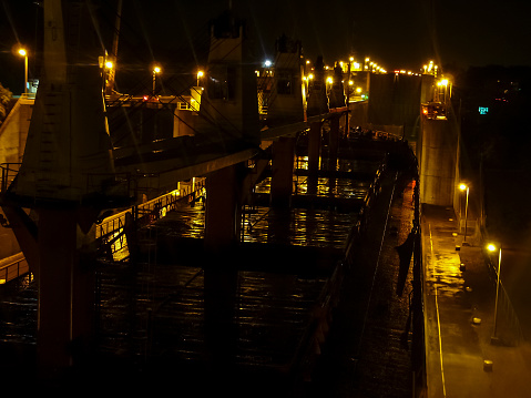 Ship at Canal lock at Night at Great Lakes in USA and Canada