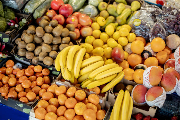 istock Fruits on counter of market 1408721454