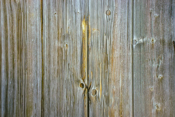 istock Brown wood background texture in the foreground with copy space for text or design 1408725316