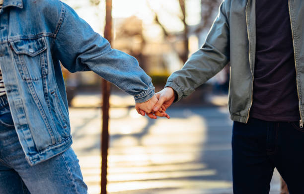 istock Unrecognizable Couple Walking Outdoors 1408727958